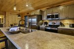 Beautiful fully furnished open concept kitchen on the main level